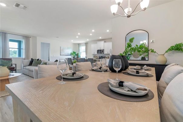 Chandelier, Dining room, Interior, Kitchen, Living room, Recessed Lighting, Stainless Steel Appliances, Wood Texture Flooring