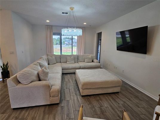 Chandelier, Interior, Living room, Recessed Lighting, Wood Texture Flooring