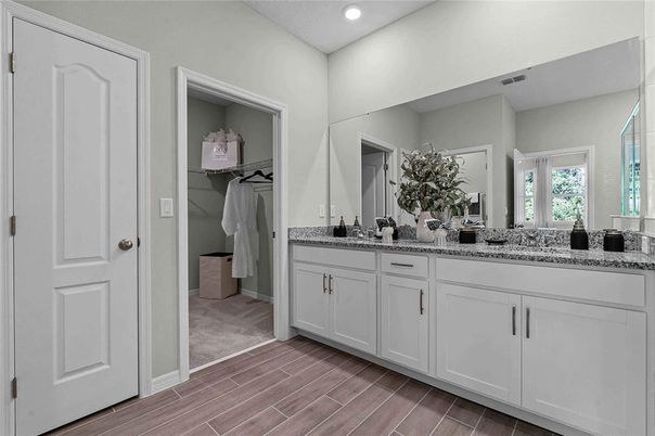 Bathroom, Dual Sink Vanities, Interior, Recessed Lighting, Wood Texture Flooring