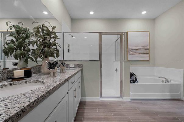 Bathroom, Dual Sink Vanities, Glass Shower, Interior, Recessed Lighting, Wood Texture Flooring