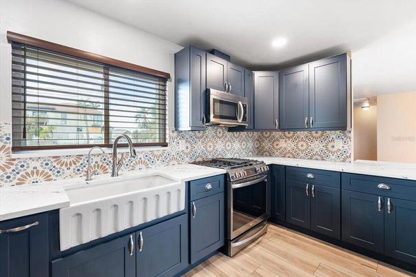 Interior, Kitchen, Recessed Lighting, Stainless Steel Appliances, Wood Texture Flooring