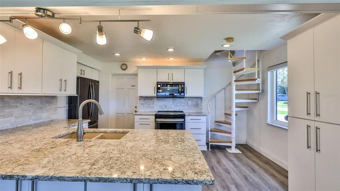 Interior, Kitchen, Recessed Lighting, Stainless Steel Appliances, Wood Texture Flooring