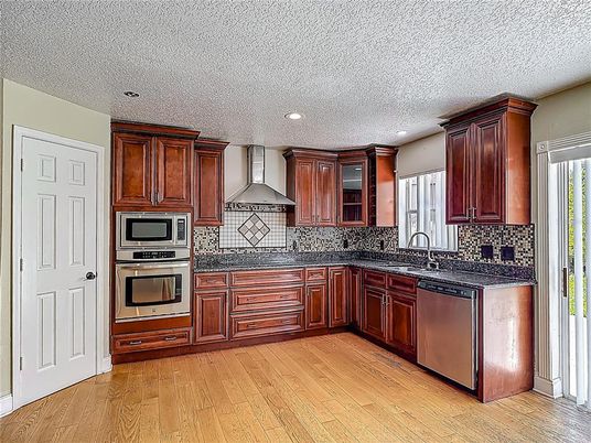 Interior, Kitchen, Recessed Lighting, Stainless Steel Appliances, Wood Texture Flooring