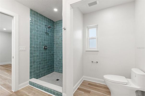 Bathroom, Glass Shower, Interior, Recessed Lighting, Wood Texture Flooring