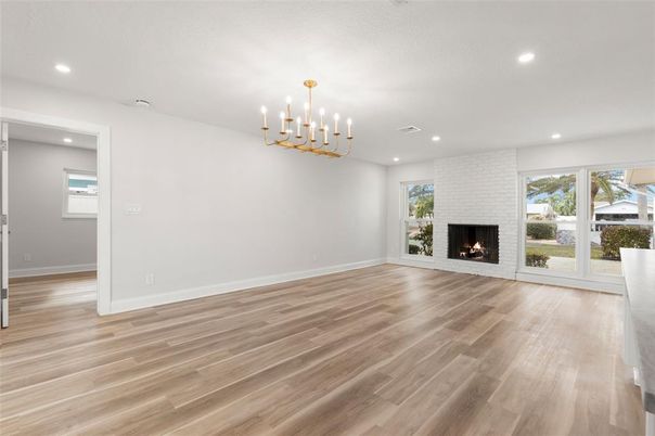 Empty room, Fireplace, Interior, Pendant Lights, Recessed Lighting, Wood Texture Flooring
