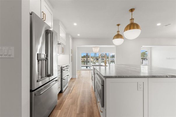 Interior, Kitchen, Pendant Lights, Recessed Lighting, Stainless Steel Appliances, Wood Texture Flooring