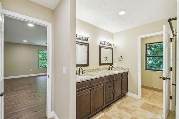 Bathroom, Dual Sink Vanities, Interior, Recessed Lighting, Wood Texture Flooring