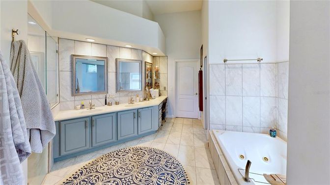 Bathroom, Dual Sink Vanities, Interior, Marble Walls, Recessed Lighting