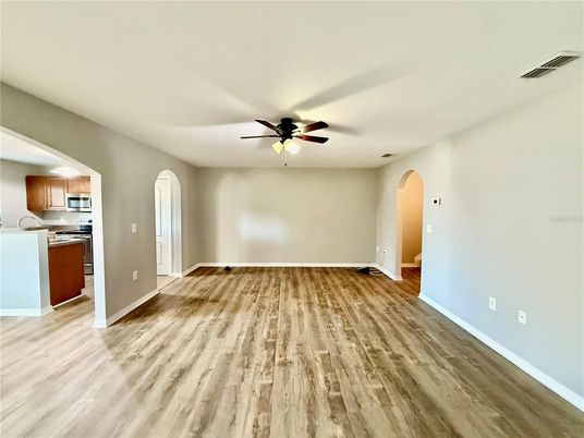 Empty room, Interior, Kitchen, Stainless Steel Appliances, Wood Texture Flooring