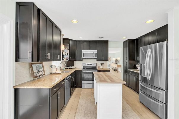 Interior, Kitchen, Recessed Lighting, Stainless Steel Appliances, Wood Texture Flooring
