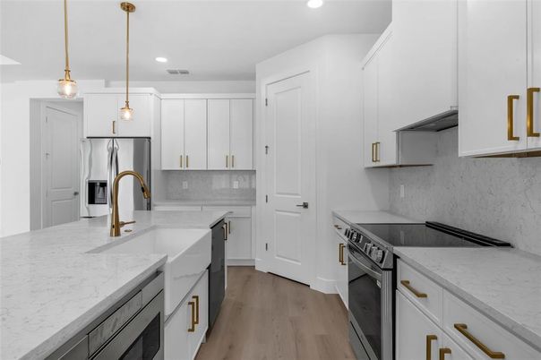 Interior, Kitchen, Pendant Lights, Recessed Lighting, Stainless Steel Appliances, Wood Texture Flooring