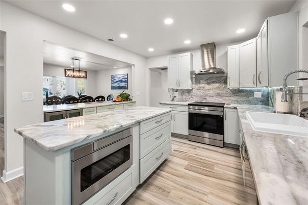 Interior, Kitchen, Pendant Lights, Recessed Lighting, Stainless Steel Appliances, Wood Texture Flooring