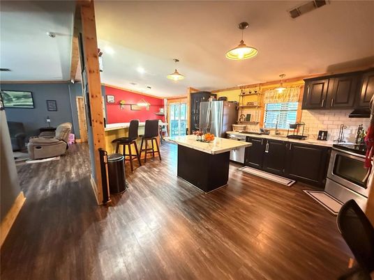 Dining room, Interior, Kitchen, Pendant Lights, Stainless Steel Appliances, Wood Texture Flooring