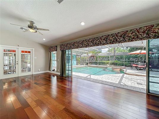 Interior, Pool, Recessed Lighting, Sun Room, Wood Texture Flooring