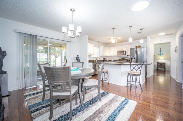 Dining room, Interior, Kitchen, Pendant Lights, Stainless Steel Appliances, Wood Texture Flooring