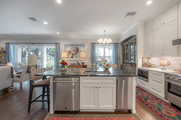 Chandelier, Dining room, Interior, Kitchen, Recessed Lighting, Stainless Steel Appliances, Wood Texture Flooring