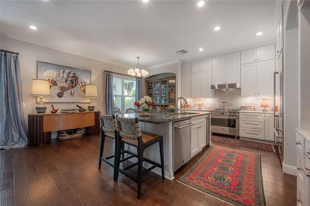 Chandelier, Interior, Kitchen, Recessed Lighting, Stainless Steel Appliances, Wood Texture Flooring