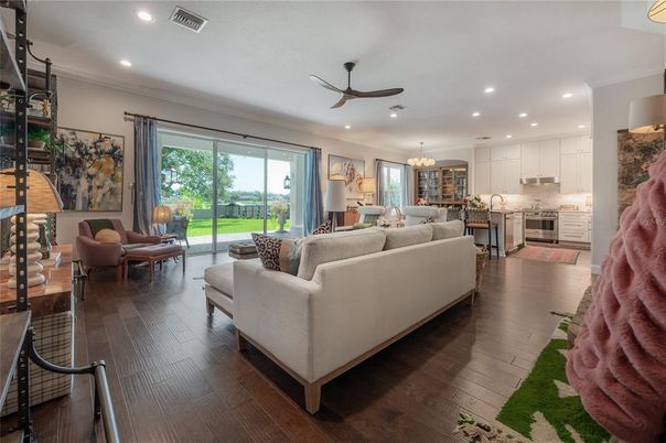 Chandelier, Interior, Kitchen, Living room, Recessed Lighting, Stainless Steel Appliances, Wood Texture Flooring