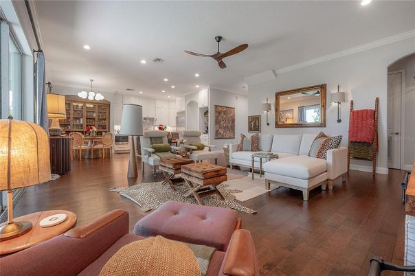 Chandelier, Dining room, Interior, Kitchen, Living room, Recessed Lighting, Stainless Steel Appliances, Wood Texture Flooring