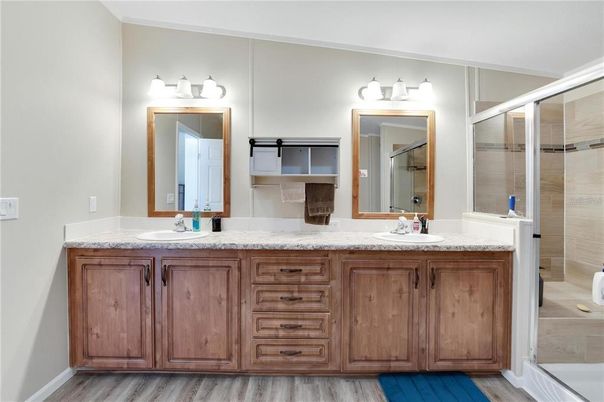 Bathroom, Dual Sink Vanities, Glass Shower, Interior, Wood Texture Flooring