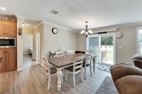 Chandelier, Dining room, Interior, Recessed Lighting, Wood Texture Flooring