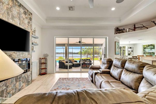 Fireplace, Interior, Living room, Pendant Lights, Recessed Lighting, Stone Walls, Water