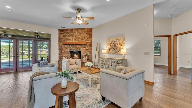 Fireplace, Interior, Living room, Recessed Lighting, Stone Walls, Wood Texture Flooring