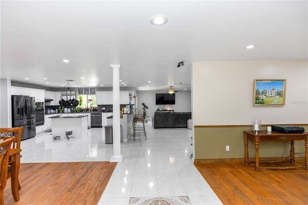 Dining room, Interior, Kitchen, Living room, Pendant Lights, Recessed Lighting, Stainless Steel Appliances, Wood Texture Flooring