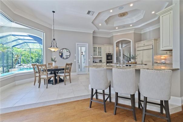 Dining room, Interior, Kitchen, Pendant Lights, Recessed Lighting, Stainless Steel Appliances, Wood Texture Flooring