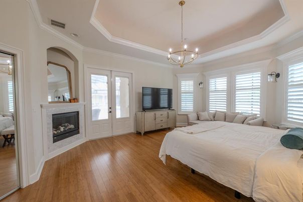 Bedroom, Chandelier, Fireplace, Interior, Pendant Lights, Wood Texture Flooring
