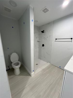 Bathroom, Interior, Marble Walls, Recessed Lighting, Wood Texture Flooring