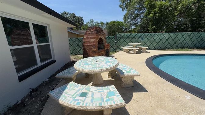Exterior, Fireplace, Pool