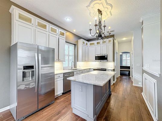 Chandelier, Interior, Kitchen, Recessed Lighting, Stainless Steel Appliances, Wood Texture Flooring