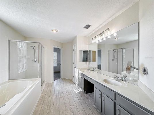 Bathroom, Dual Sink Vanities, Glass Shower, Interior, Wood Texture Flooring