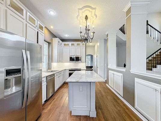 Chandelier, Interior, Kitchen, Recessed Lighting, Stainless Steel Appliances, Wood Texture Flooring