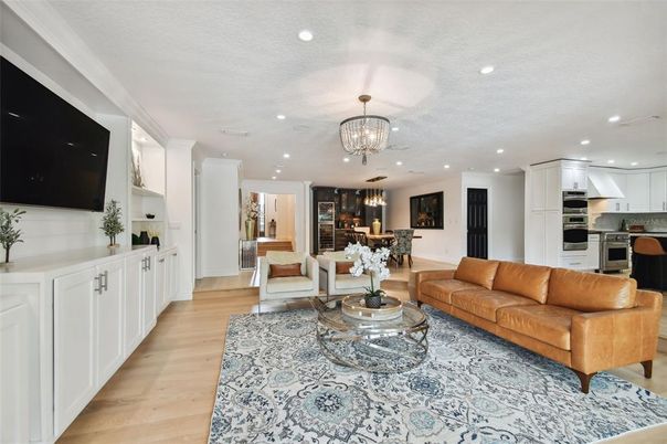 Chandelier, Dining room, Interior, Kitchen, Living room, Recessed Lighting, Stainless Steel Appliances, Wood Texture Flooring
