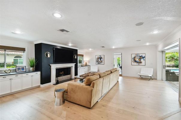 Fireplace, Interior, Living room, Recessed Lighting, Wood Texture Flooring