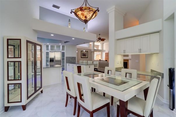 Dining room, Interior, Kitchen, Living room, Marble, Recessed Lighting, Stainless Steel Appliances