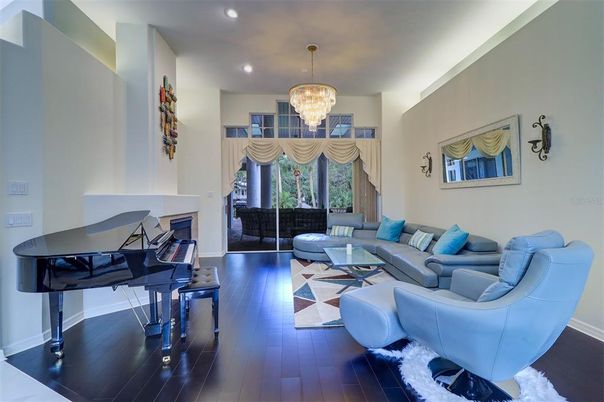 Chandelier, Interior, Living room, Piano, Recessed Lighting, Wood Texture Flooring
