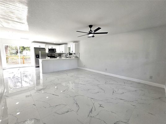 Empty room, Interior, Kitchen, Marble, Recessed Lighting, Stainless Steel Appliances