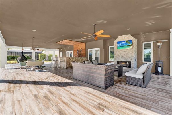 Exterior, Fireplace, Interior, Living room, Recessed Lighting, Wood Texture Flooring