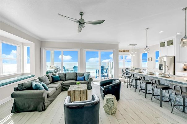 Dining room, Interior, Kitchen, Living room, Pendant Lights, Recessed Lighting, Stainless Steel Appliances, Water, Wood Texture Flooring