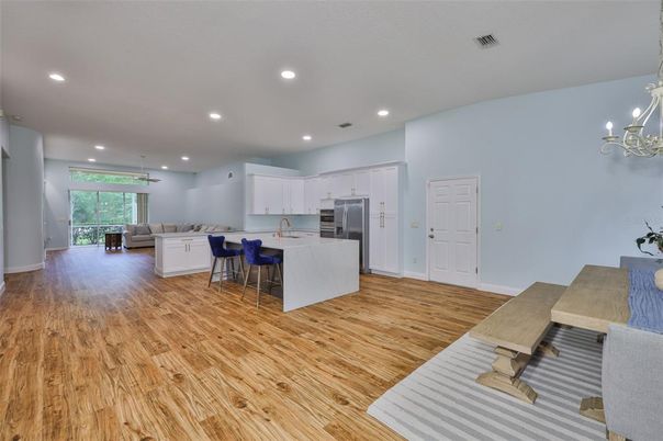 Dining room, Interior, Kitchen, Recessed Lighting, Stainless Steel Appliances, Wood Texture Flooring