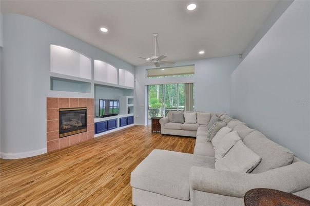 Fireplace, Interior, Living room, Recessed Lighting, Wood Texture Flooring