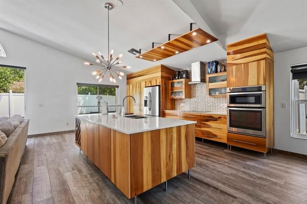 Interior, Kitchen, Pendant Lights, Recessed Lighting, Stainless Steel Appliances, Wood Texture Flooring