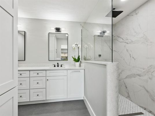 Bathroom, Dual Sink Vanities, Interior, Marble Walls, Recessed Lighting