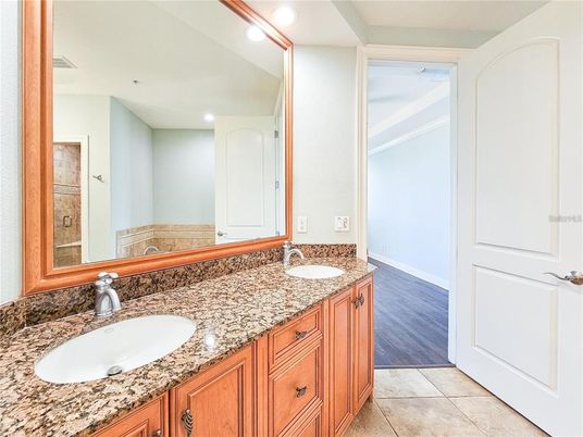 Bathroom, Dual Sink Vanities, Interior, Recessed Lighting, Wood Texture Flooring