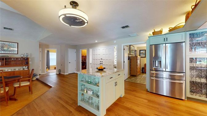 Dining room, Interior, Kitchen, Recessed Lighting, Stainless Steel Appliances, Wood Texture Flooring