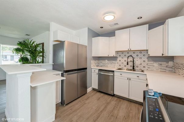 Interior, Kitchen, Recessed Lighting, Stainless Steel Appliances, Wood Texture Flooring