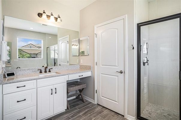 Bathroom, Dual Sink Vanities, Glass Shower, Interior, Wood Texture Flooring